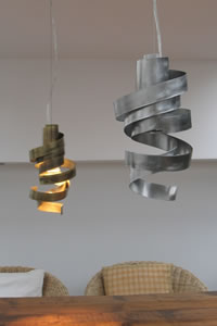 Small pendant fixtures and recessed downlights are effective over a kitchen island. make sure it can be controlled with a dimmer switch. This pendant lighting will surely complement and enhance your kitchen.